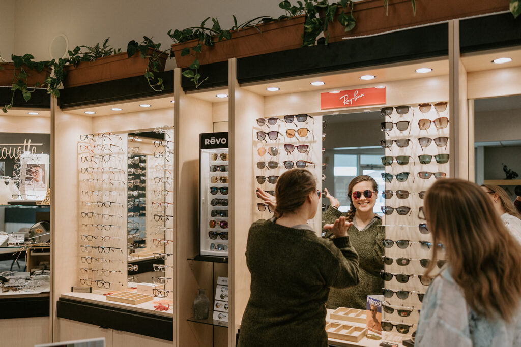 A patient tries on new glasses frames